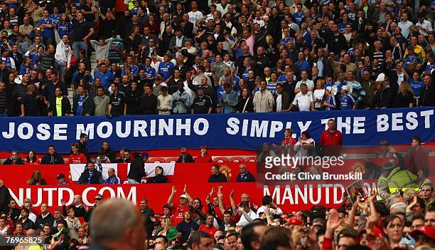 Chelsea fans pay tribute to former manager Jose Mourinho prior to the Barclays Premier League match between Manchester United and Chelsea at Old...