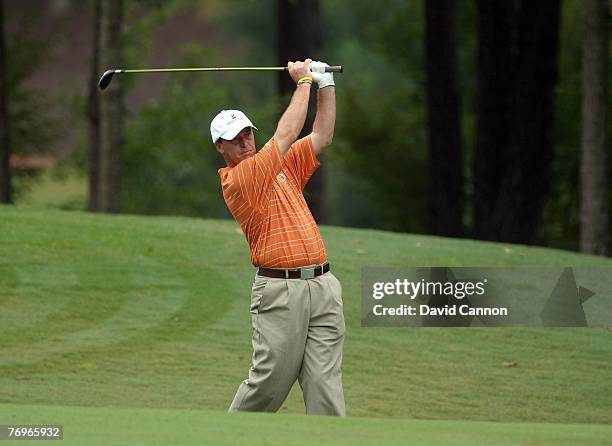 Jon Bevan of the Great Britain & Ireland Team hits his second shot at the first hole during the final day singles matches for the 23rd PGA Cup...