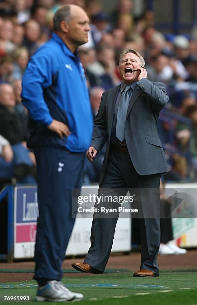 Sammy Lee, manager of Bolton reacts during the Barclays Premier League match between Bolton Wanderers and Tottenham Hotspur at the Reebok Stadium on...