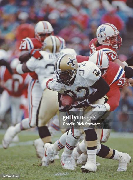 Vaughn Dunbar, Running Back for the New Orleans Saints runs the ball during the American Football Conference East game against the New England...