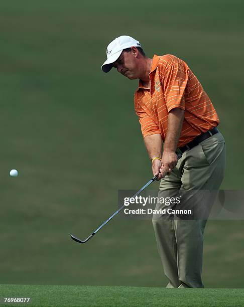 Jon Bevan of the Great Britain & Ireland Team hits his third shot at the 18th hole during the final day singles matches for the 23rd PGA Cup Matches,...