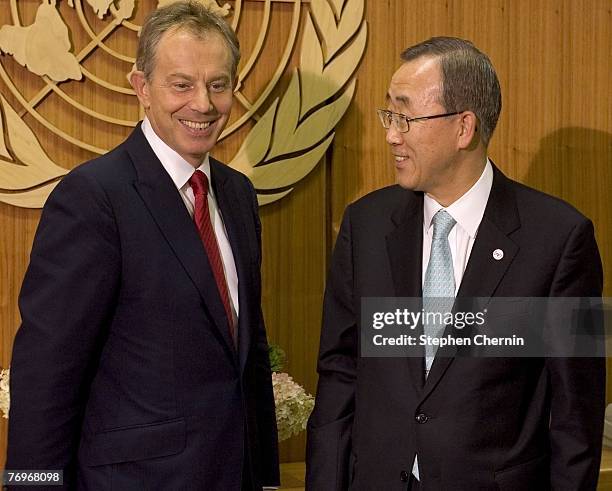 Former U.K. Prime Minister and now special delegate to the Mideast Quartet Tony Blair smiles as he meets United Nations Secretary-General Ban Ki-Moon...