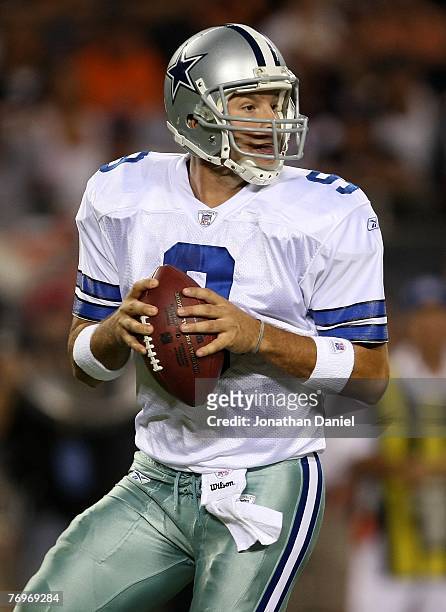Quarterback Tony Romo of the Dallas Cowboys drops back to pass against the Chicago Bears at Soldier Field on September 23, 2007 in Chicago, Illinois.