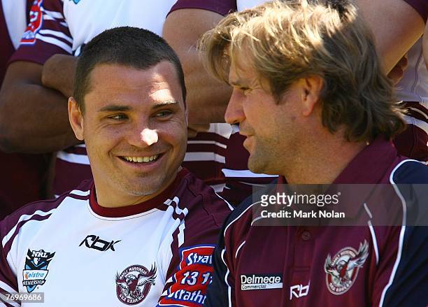Anthony Watmough and Des Hasler chat during a team photo before a Manly Warringah Sea Eagles NRL training session at the Sydney Academy of Sport in...