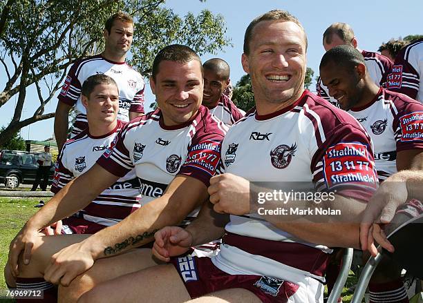 Anthony Watmough and Matt Orford chat during a team photo before a Manly Warringah Sea Eagles NRL training session at the Sydney Academy of Sport in...