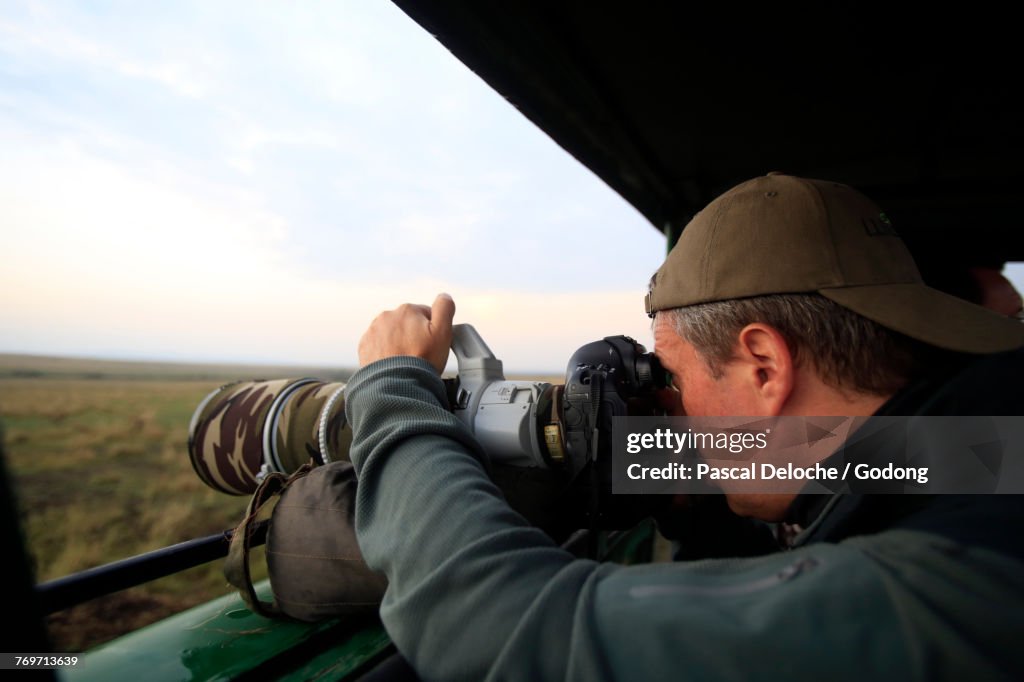 Safari photo. Wildlife photographer. Masai Mara game reserve. Kenya.
