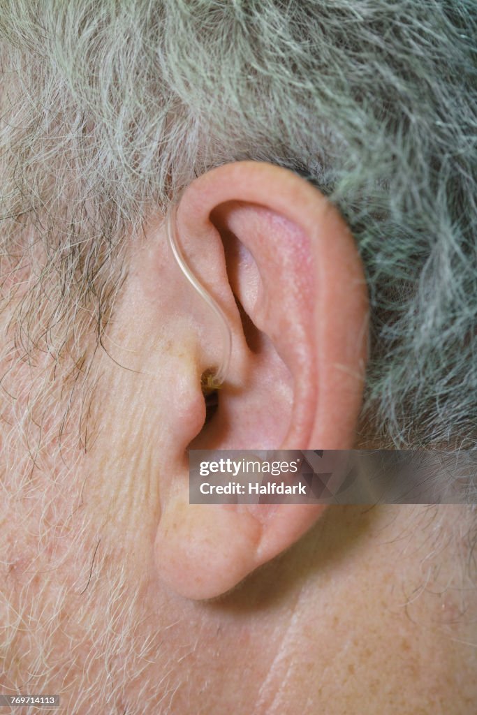 Cropped image of man wearing hearing aid