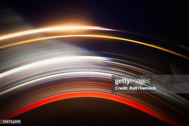 various abstract light trails against black background - colour and abstract and impact not people stock pictures, royalty-free photos & images