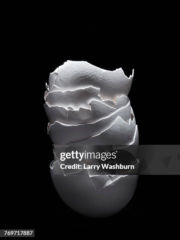 Stack of broken eggshell on black background Stack of broken eggshell on black background