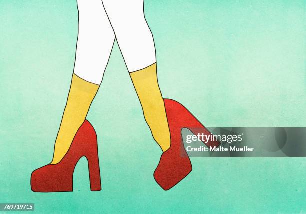 illustrative image of woman wearing red high heels against green background - red shoe stock illustrations