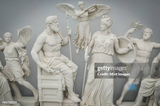 classical greek sculptures of gods and goddesses, athens, greece. - mythologie stock-fotos und bilder