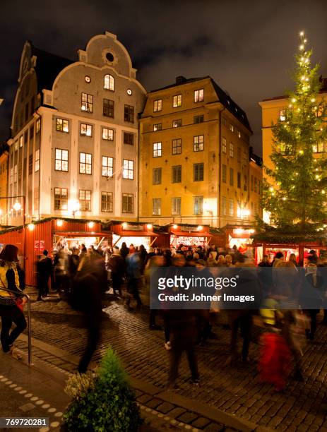 crowded christmas market - stockholm winter stock pictures, royalty-free photos & images