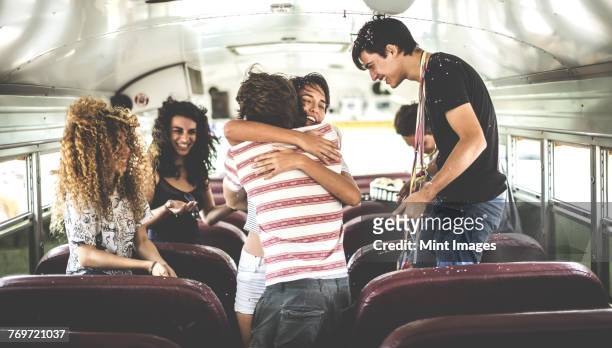 a group of young people in a party on a school bus. - party bus stock pictures, royalty-free photos & images