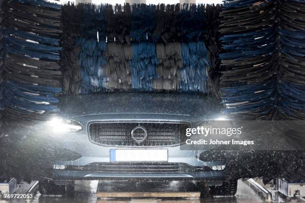 car in car wash - car wash stock pictures, royalty-free photos & images