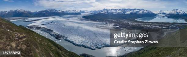 panoramic view of glacier and mountains on sunny day, knik glacier. palmer, alaska, usa - knik glacier stock pictures, royalty-free photos & images