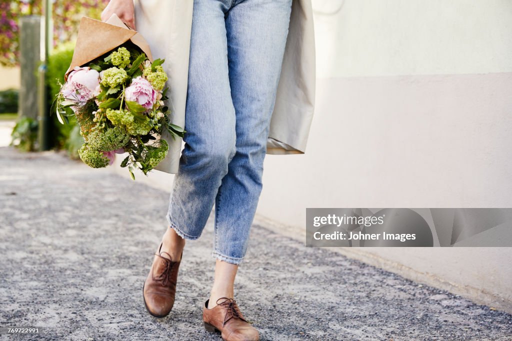 Woman holding flowers