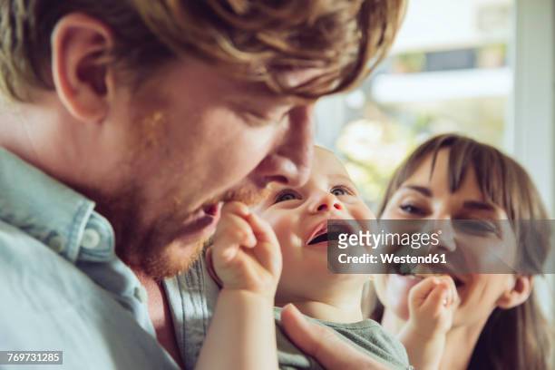 happy couple with baby - mum dad and baby fotografías e imágenes de stock