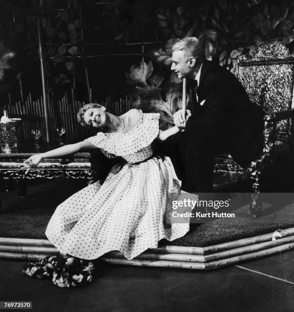 Mary Martin and Wilbur Evans star as Nellie Forbush and Emile de Becque in the Rodgers and Hammerstein musical 'South Pacific' at the Drury Lane...