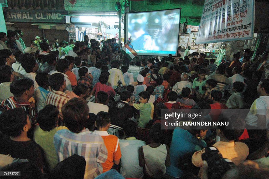 Indian cricket fans watch the final matc