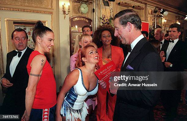 The Prince of Wales gets a warm reception from the Spice girls, as he jokes with Geri Halliwell at the Princes Trust concert, Manchester on May 9th,...