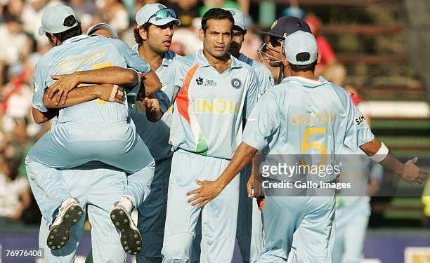 September 24: Irfan Pathan of India and his team mates celebrate the wicket of Shoib Malik of Pakistan for 6 runs during the Twenty20 Championship...