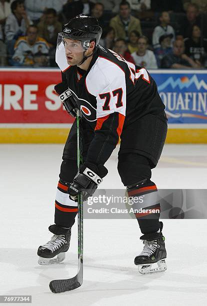 Ryan Parent of the Philadelphia Flyers waits for a face-off in a pre-season game against the Ottawa Senators played at the John Labatt Centre on...