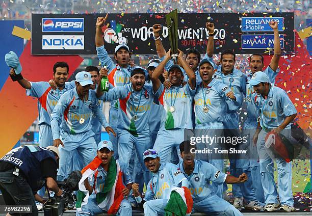 The Indian team celebrate with the trophy during the Twenty20 Championship Final match between Pakistan and India at The Wanderers Stadium on...