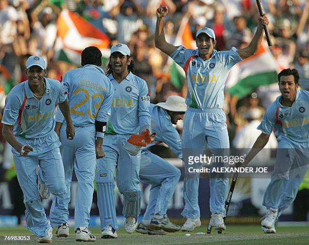 Indian players celebrate winning the Twenty20 cricket world championship final at Wanderer's Stadium in Johannesburg, 24 September 2007. India won...