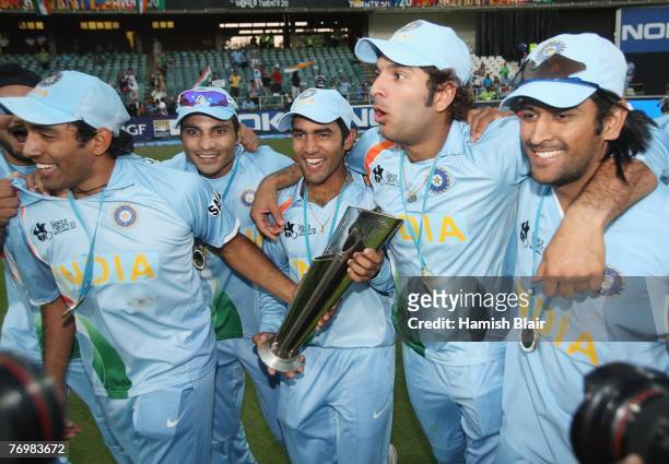 The Indian team celebrates its win after the Twenty20 Championship Final match between Pakistan and India at The Wanderers Stadium on September 24,...