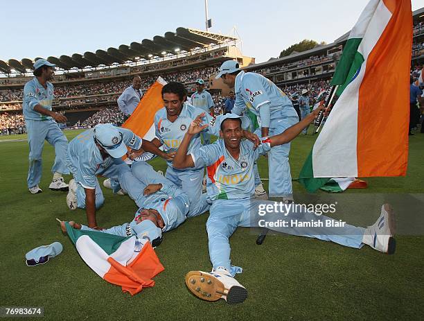 The Indian team celebrates its win after the Twenty20 Championship Final match between Pakistan and India at The Wanderers Stadium on September 24,...