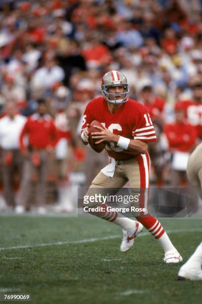 Quarterback Joe Montana of the San Francisco 49ers drops back to pass during a game against the Minnesota Vikings at Candlestick Park on December 8,...