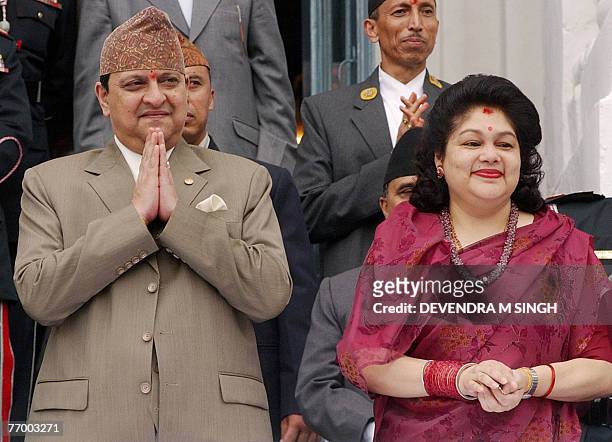 In this picture taken 06 September 2006, Nepal's King Gyanendra and Queen Komal watch a chariot procession carrying Kumari, a pre-pubescent girl...