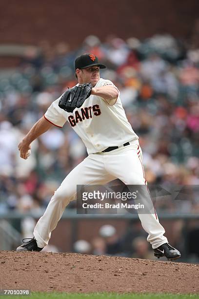 Brian Wilson of the San Francisco Giants pitches during the game against the Cincinnati Reds at AT&T Park in San Francisco, California on September...