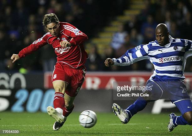 Fernando Torres of Liverpool scores his first and Liverpool's second goal during the Carling Cup third round match between Reading and Liverpool at...