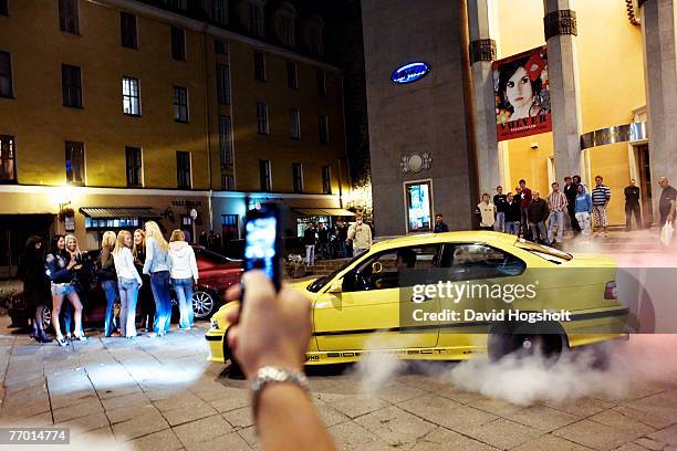 Tuned BMW doing a burnout in front of the night club Hollywood September 15, 2006 in Tallinn, Estonia. Once a month the night club held a car theme...