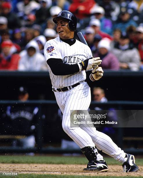 Andres Galarraga of the Colorado Rockies batting during a MLB game against the Cincinnati Reds on April 9, 1997 in Denver, Colorado.