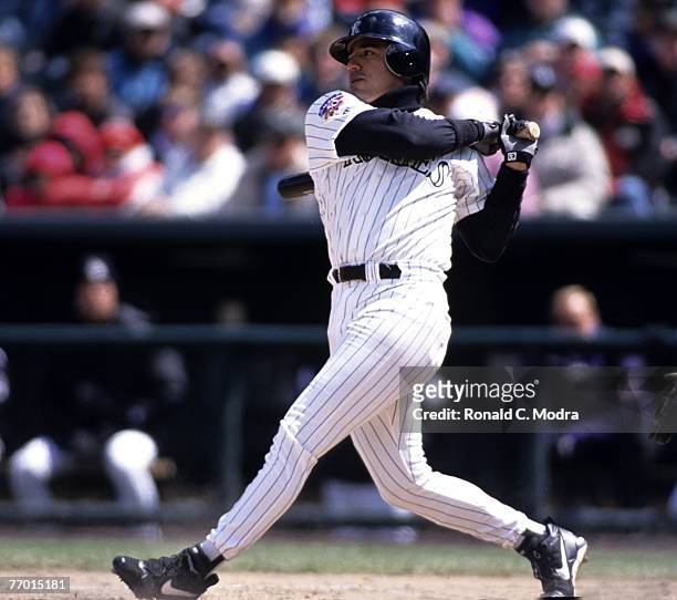 Vinnie Castilla of the Colorado Rockies batting during a MLB game against the Cincinnati Reds on April 9, 1997 in Denver, Colorado.