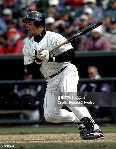 Andres Galarraga of the Colorado Rockies batting during a MLB game against the Cincinnati Reds on April 9, 1997 in Denver, Colorado.