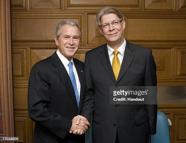 In this photo provided by the White House, U.S. President George W. Bush poses for a photo with President of Latvia Valdis Zatlers during their...
