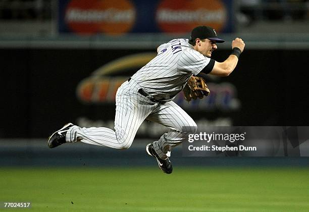 Shortstop Troy Tulowitzki of the Colorado Rockies throws to first for the double play against the Los Angeles Dodgers on September 25, 2007 at Dodger...