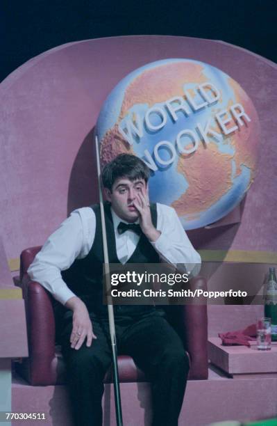 English professional snooker player Ronnie O'Sullivan pictured with a concerned look on his face during competition against fellow English snooker...