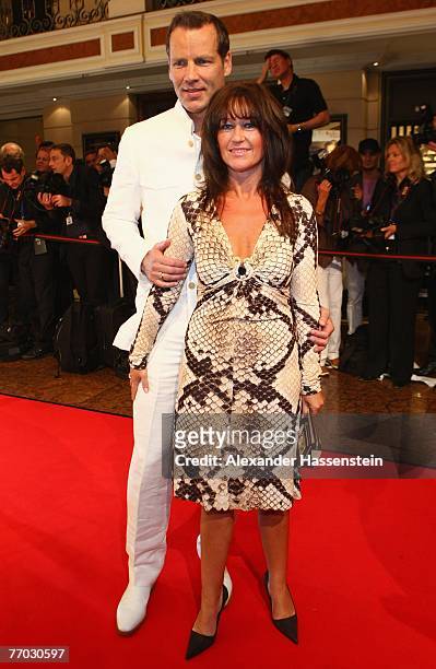 Former boxer Henry Maske and his wife Manuela Maske arrive for the United People Charity Night 2007 on September 21, 2007 in Munich, Germany.