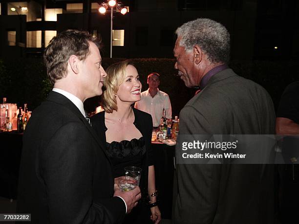 Actors Greg Kinnear , Radha Mitchell and Morgan Freeman chat during the after-party for the premiere of MGM's "Feast of Love" at the Academy of...