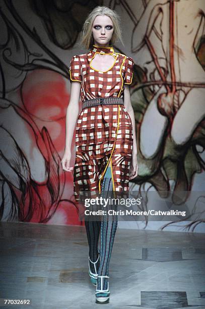 Model walks down the catwalk during the Prada fashion show as part of Milan Fashion Week Spring Summer 08 on September 25, 2007 in Milan, Italy.