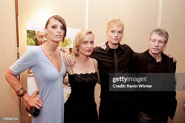 Actors Stana Katic, Radha Mitchell, Toby Hemingway and Fred Ward pose at the premiere of MGM's "Feast of Love" at the Academy of Motion Picture Arts...