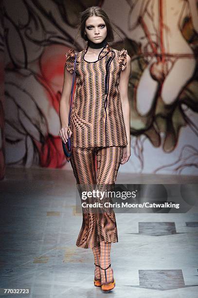 Model walks down the catwalk during the Prada fashion show as part of Milan Fashion Week Spring Summer 08 on September 25, 2007 in Milan, Italy.