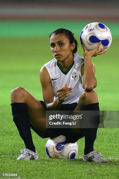 Marta of Brazil holds a ball during a training session ahead of the Semi Finals of the FIFA Women's World Cup China 2007 at Hangzhou Dragon Stadium...