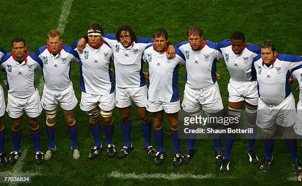 The Namibia team line up for the anthems prior to kickoff during the Rugby World Cup 2007 Pool C match between Georgia and Namibia at the Stade Felix...