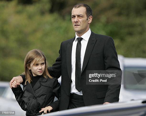 Mark Porcelli, father of Ben Porcelli who was killed in a helicopter crash and family, arrive for the funeral of Colin McRae and son Johnny at East...