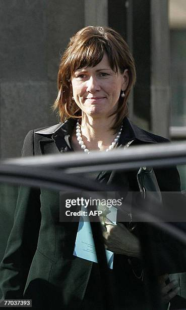 Alison McRae, wife of former world rally champion Colin McRae, leaves after a funeral service for her husband and son Johnny at East Chapel, Daldowie...